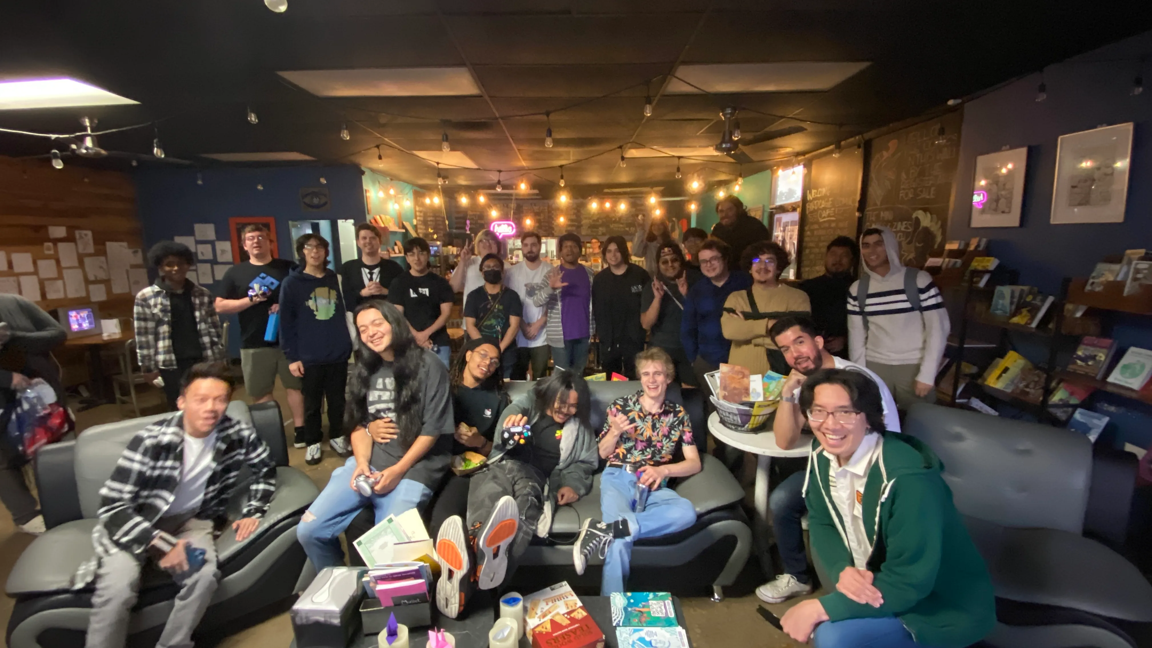 A group of video game players at a cafe