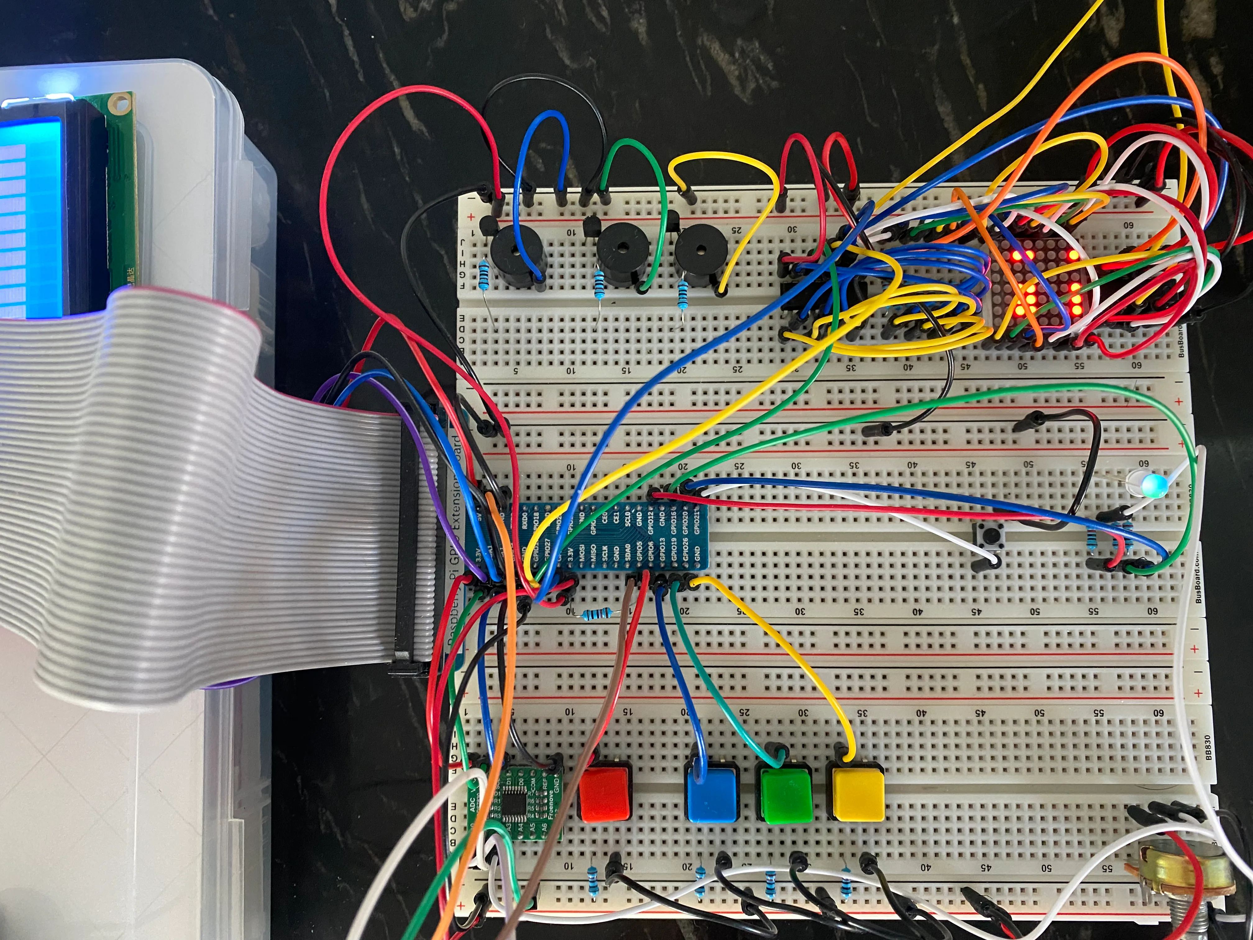 Many components wired to an MCU on a breadboard